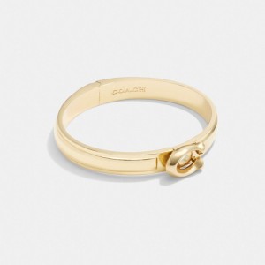 Women Coach Tabby Hinged Bangle Bangles Gold | IN_CH15400